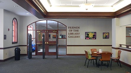 Front doors and waiting area outside of the Friends of the Library Gallery