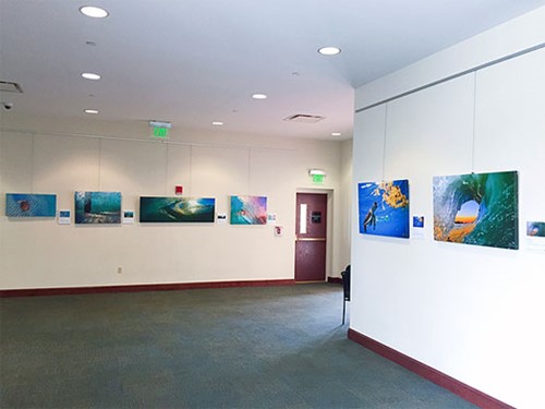 Photo of two walls covered in art